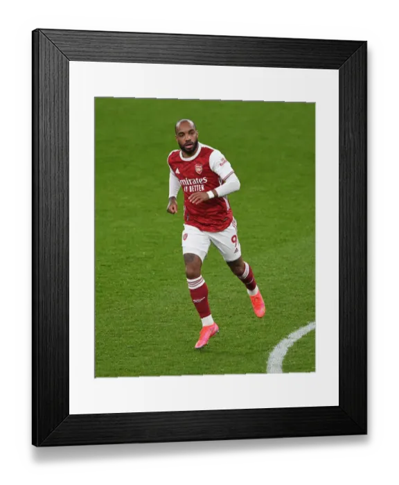 Framed Print : Arsenal's Lacazette in Action Against Manchester City (2020-21) - Emirates Stadium, London (Behind Closed Doors)