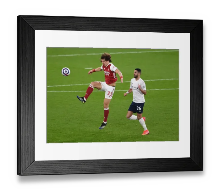 Framed Print : Arsenal vs Manchester City: David Luiz Fends Off Mahrez Amid Empty Emirates Stadium (Premier League 2020-21) Framed Print : Arsenal vs Manchester City: David Luiz Fends Off Mahrez Amid Empty Emirates Stadium (Premier League 2020-21)