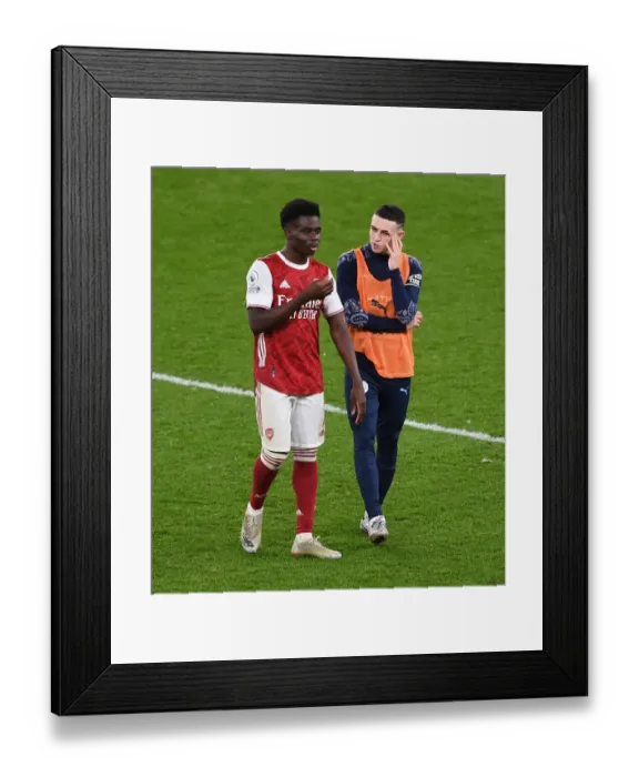 Framed Print : Arsenal's Bukayo Saka and Phil Foden Exchange Words After Arsenal v Manchester City, 2021-22 Premier League