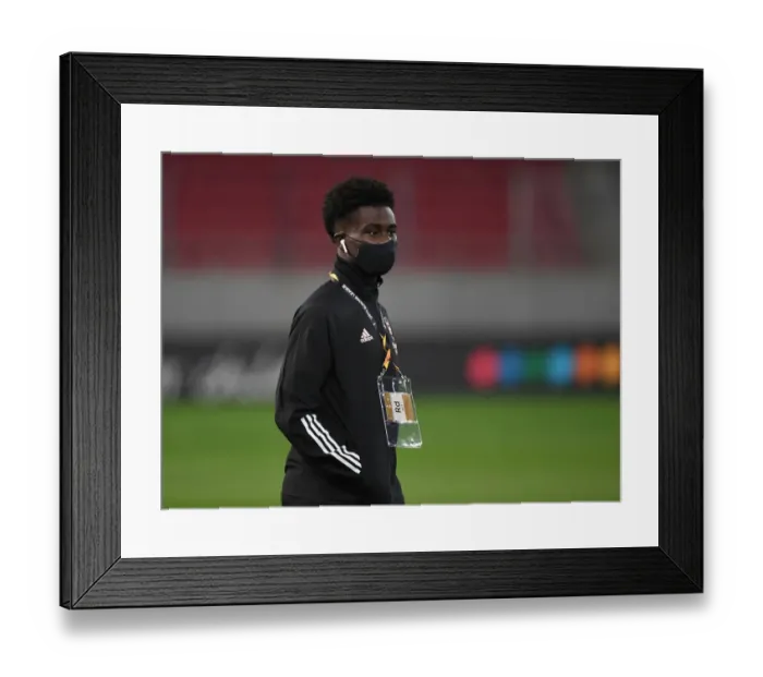 Framed Print : Arsenal's Bukayo Saka Prepares for SL Benfica Clash in Europa League Round of 32 (Piraeus, Greece - February 25, 2021) Framed Print : Arsenal's Bukayo Saka Prepares for SL Benfica Clash in Europa League Round of 32 (Piraeus, Greece - February 25, 2021)