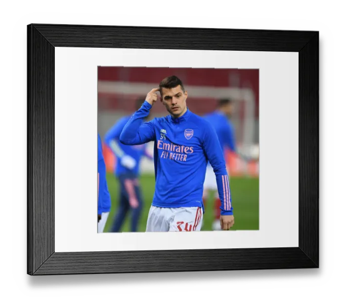 Framed Print : Granit Xhaka: Arsenal's Europa League Warrior Readies for Battle Against SL Benfica Framed Print : Granit Xhaka: Arsenal's Europa League Warrior Readies for Battle Against SL Benfica