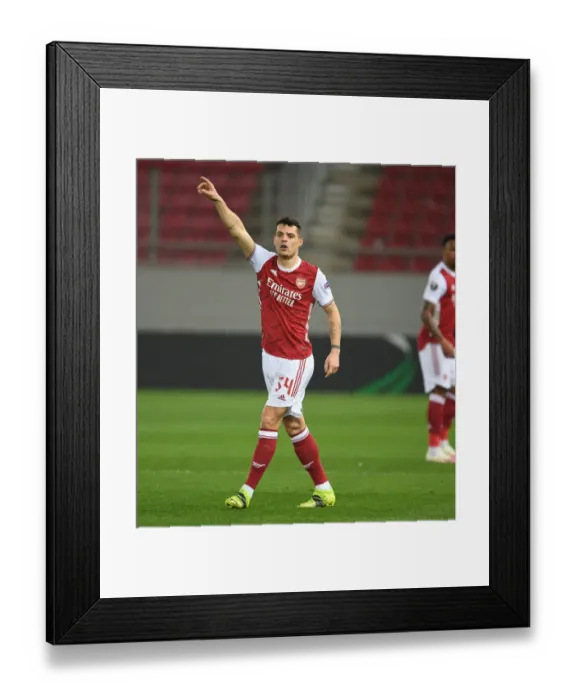 Framed Print : Granit Xhaka in Action: Arsenal vs SL Benfica, UEFA Europa League 2021, Piraeus, Greece