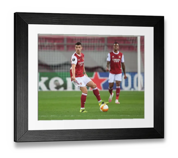 Framed Print : Granit Xhaka: Arsenal's Europa League Battle in Piraeus against SL Benfica (February 2021) Framed Print : Granit Xhaka: Arsenal's Europa League Battle in Piraeus against SL Benfica (February 2021)