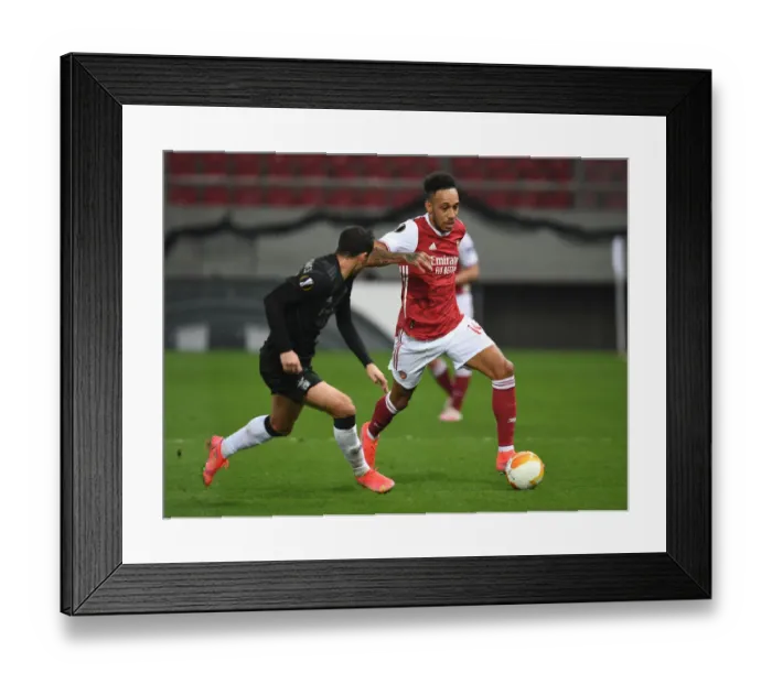 Framed Print : Aubameyang vs. Goncalves: Intense Face-Off in Arsenal's Europa League Battle against Benfica