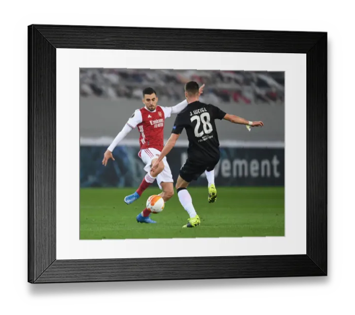 Framed Print : Arsenal's Dani Ceballos Clashes with Benfica's Weigl in Europa League Showdown Framed Print : Arsenal's Dani Ceballos Clashes with Benfica's Weigl in Europa League Showdown