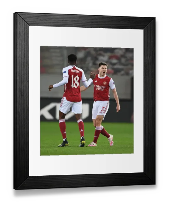 Framed Print : Arsenal's Tierney and Partey: Celebrating Goals in Europa League Victory over SL Benfica Framed Print : Arsenal's Tierney and Partey: Celebrating Goals in Europa League Victory over SL Benfica