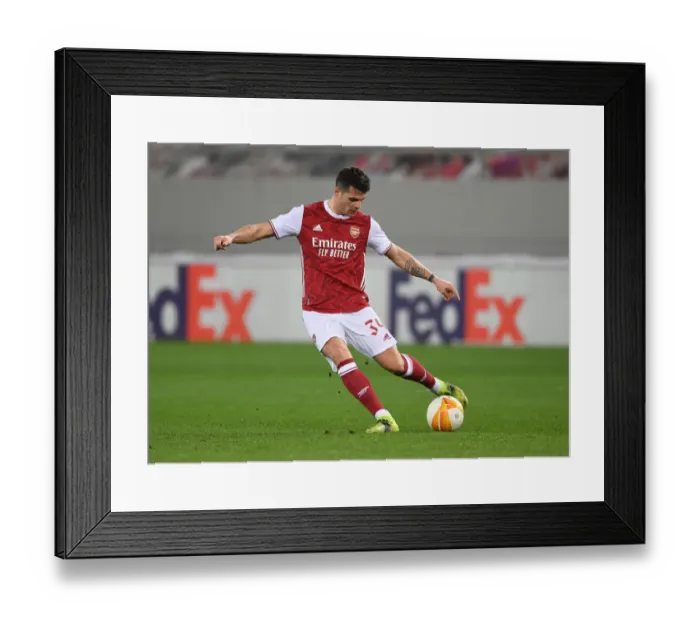Framed Print : Granit Xhaka in Action: Arsenal vs SL Benfica, UEFA Europa League 2021, Piraeus Framed Print : Granit Xhaka in Action: Arsenal vs SL Benfica, UEFA Europa League 2021, Piraeus
