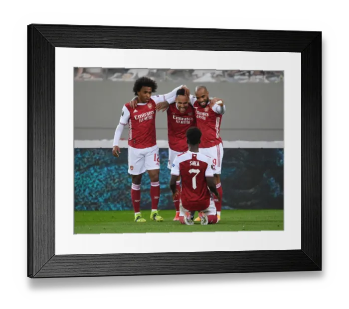 Framed Print : Arsenal's Aubameyang, Lacazette, and Saka Celebrate Goals Against SL Benfica in Europa League