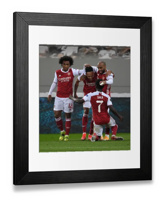 Framed Print : Arsenal's Aubameyang, Willian, Saka, and Lacazette Celebrate Goals Against SL Benfica in Europa League