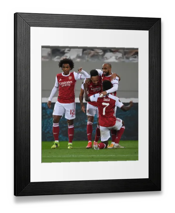 Framed Print : Arsenal's Aubameyang, Willian, and Lacazette Celebrate Goals Against SL Benfica in Europa League