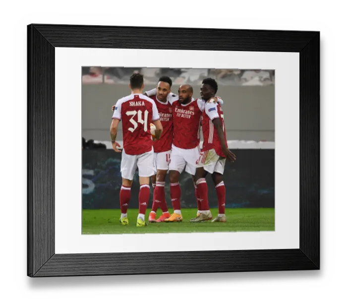 Framed Print : Arsenal Celebrate as Aubameyang Scores in Europa League Win over SL Benfica