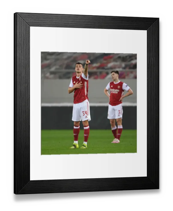 Framed Print : Granit Xhaka's Europa League Showdown: Arsenal vs. SL Benfica in Piraeus