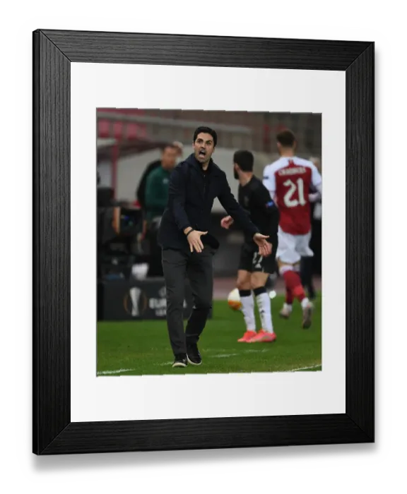 Framed Print : Mikel Arteta Leads Arsenal in Europa League Clash against SL Benfica (Piraeus, 2021) Framed Print : Mikel Arteta Leads Arsenal in Europa League Clash against SL Benfica (Piraeus, 2021)