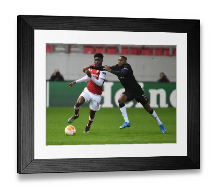 Framed Print : Thomas Partey vs. Nuno Tavares: A Europa League Showdown Framed Print : Thomas Partey vs. Nuno Tavares: A Europa League Showdown