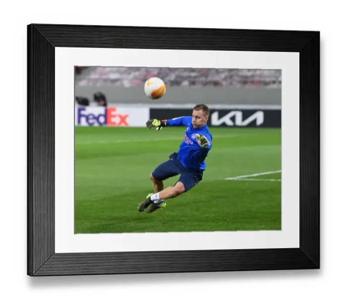 Framed Print : Arsenal's Bernd Leno: Focused During Europa League Warm-Up vs SL Benfica Framed Print : Arsenal's Bernd Leno: Focused During Europa League Warm-Up vs SL Benfica
