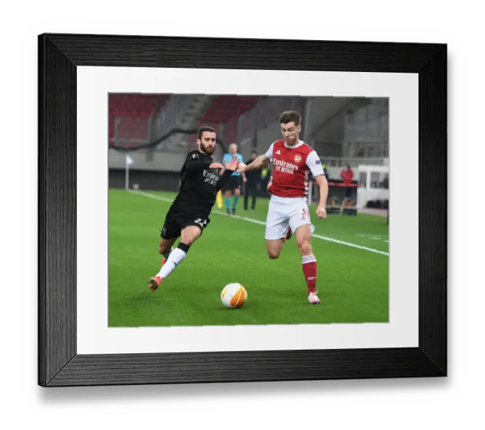 Framed Print : Arsenal vs Benfica: Kieran Tierney Clashes with Rafa in Europa League Showdown