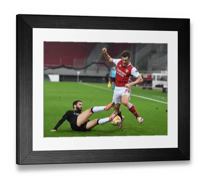 Framed Print : Arsenal's Kieran Tierney Faces Off Against Benfica's Rafa in Europa League Clash