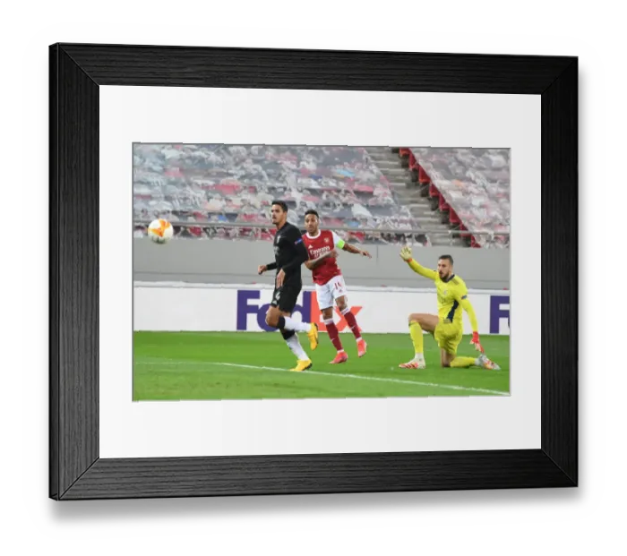 Framed Print : Aubameyang Scores: Arsenal Edge Past Benfica in Europa League Clash