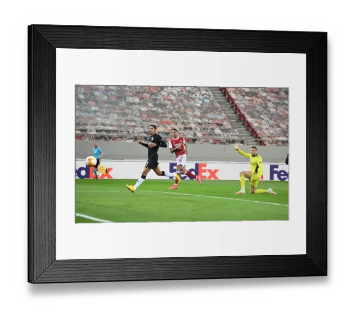 Framed Print : Aubameyang's Strike: Arsenal Advances in Europa League against Benfica