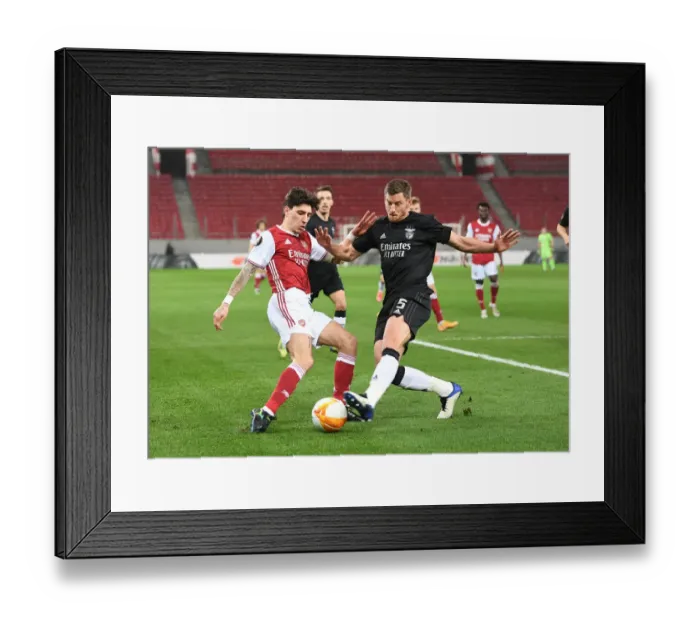 Framed Print : Arsenal's Bellerin Clashes with Benfica's Vertonghen in Europa League Showdown Framed Print : Arsenal's Bellerin Clashes with Benfica's Vertonghen in Europa League Showdown