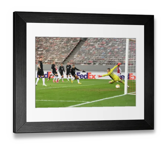 Framed Print : Arsenal's Kieran Tierney Scores Second Goal in Europa League Clash Against SL Benfica