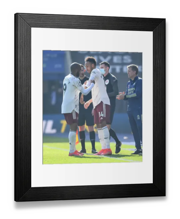Framed Print : Arsenal's Aubameyang Receives Captain's Armband from Lacazette in Empty Leicester Stadium (Leicester City vs Arsenal, 2021) Framed Print : Arsenal's Aubameyang Receives Captain's Armband from Lacazette in Empty Leicester Stadium (Leicester City vs Arsenal, 2021)