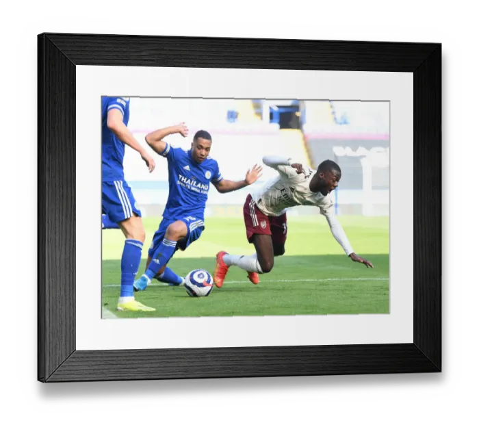 Framed Print : Pepe Tripped by Tielemans: Leicester vs. Arsenal, 2021 Premier League Clash Amidst Empty Stands