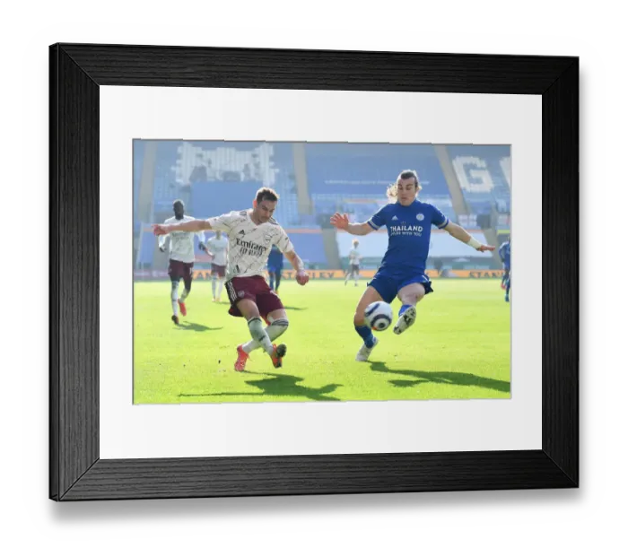 Framed Print : Arsenal's Cedric Soares Faces Off Against Leicester's Caglar Soyuncu: Premier League Showdown Framed Print : Arsenal's Cedric Soares Faces Off Against Leicester's Caglar Soyuncu: Premier League Showdown