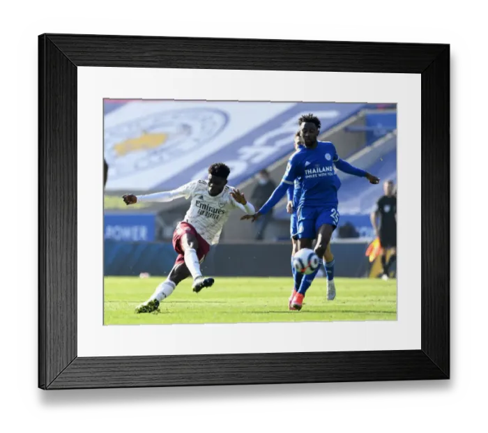 Framed Print : Thomas Partey vs. Wilfred Ndidi: A Premier League Battle at The King Power Stadium Framed Print : Thomas Partey vs. Wilfred Ndidi: A Premier League Battle at The King Power Stadium
