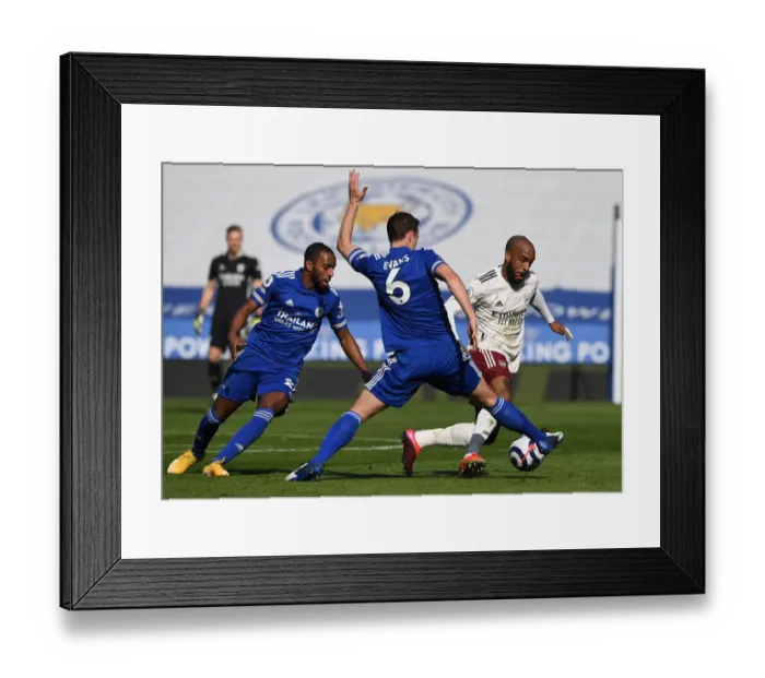 Framed Print : Leicester City vs Arsenal: Lacazette Takes on Evans and Pereira in Intense Premier League Clash Framed Print : Leicester City vs Arsenal: Lacazette Takes on Evans and Pereira in Intense Premier League Clash