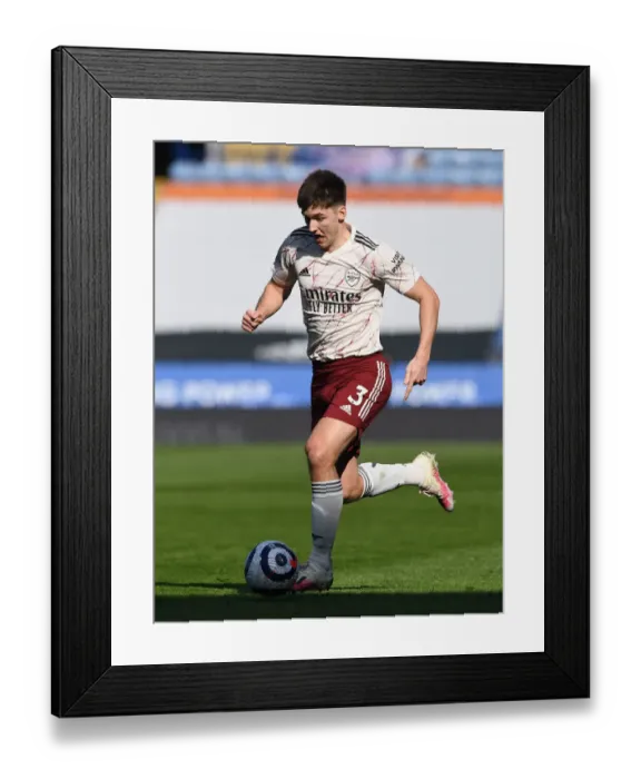 Framed Print : Arsenal's Kieran Tierney in Action: Leicester City vs Arsenal, Premier League 2020-21