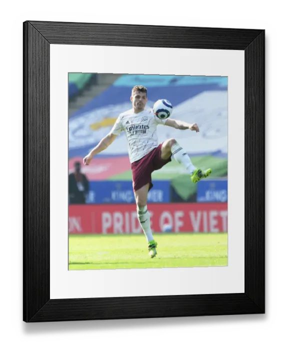 Framed Print : Granit Xhaka in Action: Arsenal vs Leicester City Showdown at The King Power Stadium