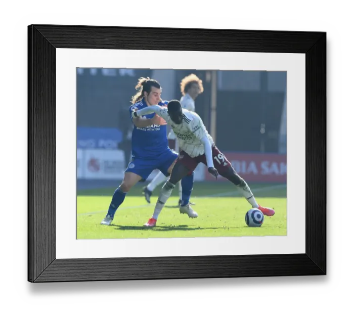 Framed Print : Pepe vs Soyuncu: Battle at The King Power Stadium - Leicester City vs Arsenal, Premier League 2020-21