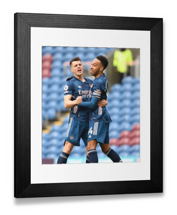 Framed Print : Aubameyang and Xhaka Celebrate Arsenal's Goal Against Burnley in Empty Turf Moor (2020-21) Framed Print : Aubameyang and Xhaka Celebrate Arsenal's Goal Against Burnley in Empty Turf Moor (2020-21)