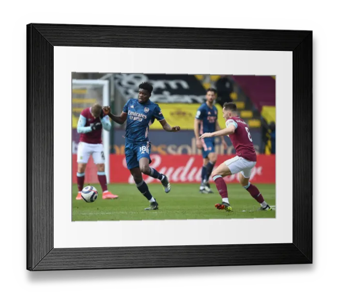 Framed Print : Thomas Partey vs. Josh Brownhill: A Battle at Turf Moor in the Empty Premier League
