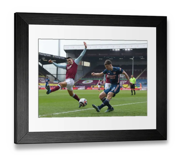 Framed Print : Burnley vs. Arsenal: Tierney Tangles with Lowton Amid Empty Turf Moor