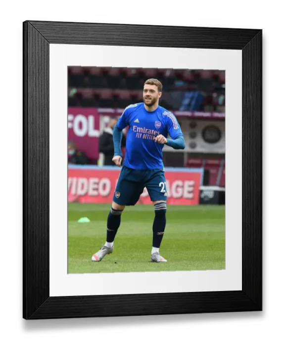 Framed Print : Calum Chambers Prepares for Burnley Clash in Empty Turf Moor (Burnley vs Arsenal 2021) Framed Print : Calum Chambers Prepares for Burnley Clash in Empty Turf Moor (Burnley vs Arsenal 2021)
