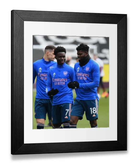 Framed Print : Burnley vs. Arsenal: Partey and Saka in Action at Empty Turf Moor, Premier League 2020-21