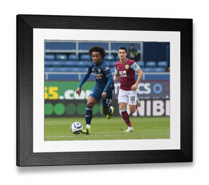 Framed Print : Willian in Action: Arsenal vs. Burnley Amidst Empty Stands (2021)