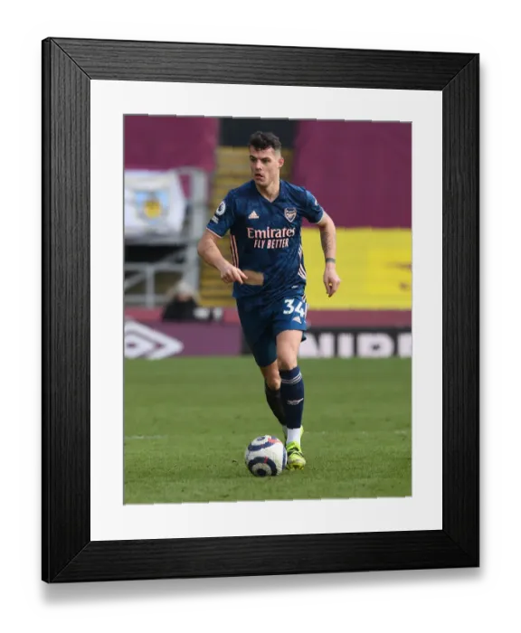 Framed Print : Granit Xhaka in Action: Arsenal's Empty Turf Moor Battle against Burnley, Premier League 2020-21