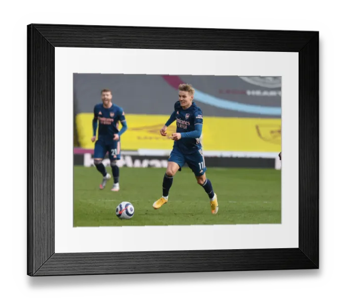 Framed Print : Martin Odegaard Shines in Empty Turf Moor: Arsenal's Triumph over Burnley in the Premier League Amidst COVID-19 Restrictions, March 2021 Framed Print : Martin Odegaard Shines in Empty Turf Moor: Arsenal's Triumph over Burnley in the Premier League Amidst COVID-19 Restrictions, March 2021