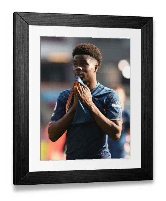 Framed Print : Bukayo Saka - Arsenal's Lone Warrior in Empty Turf Moor: Burnley vs Arsenal (2021-22 Premier League)