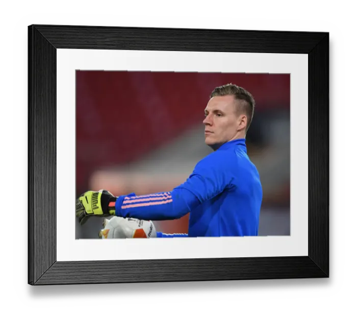 Framed Print : Arsenal's Bernd Leno Prepares for Olympiacos Showdown in Empty Europa League Stadium Framed Print : Arsenal's Bernd Leno Prepares for Olympiacos Showdown in Empty Europa League Stadium