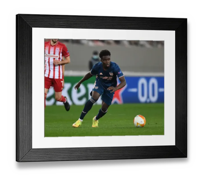 Framed Print : Bukayo Saka Shines in Empty Karaiskakis Stadium: Arsenal's Europa League Victory over Olympiacos (March 11, 2021) Framed Print : Bukayo Saka Shines in Empty Karaiskakis Stadium: Arsenal's Europa League Victory over Olympiacos (March 11, 2021)