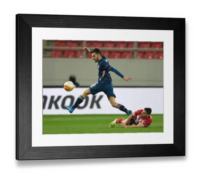 Framed Print : Dani Ceballos Breaks Past Olympiacos Ahmed Hassan in Empty Karaiskakis Stadium - Arsenal vs Olympiacos, UEFA Europa League Round of 16 (March 2021)