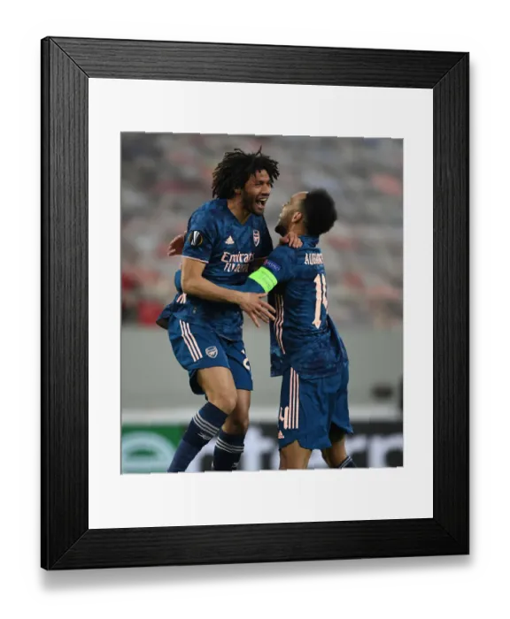Framed Print : Arsenal's Aubameyang and Elneny Celebrate Goals in Empty Olympiacos Stadium during Europa League Match