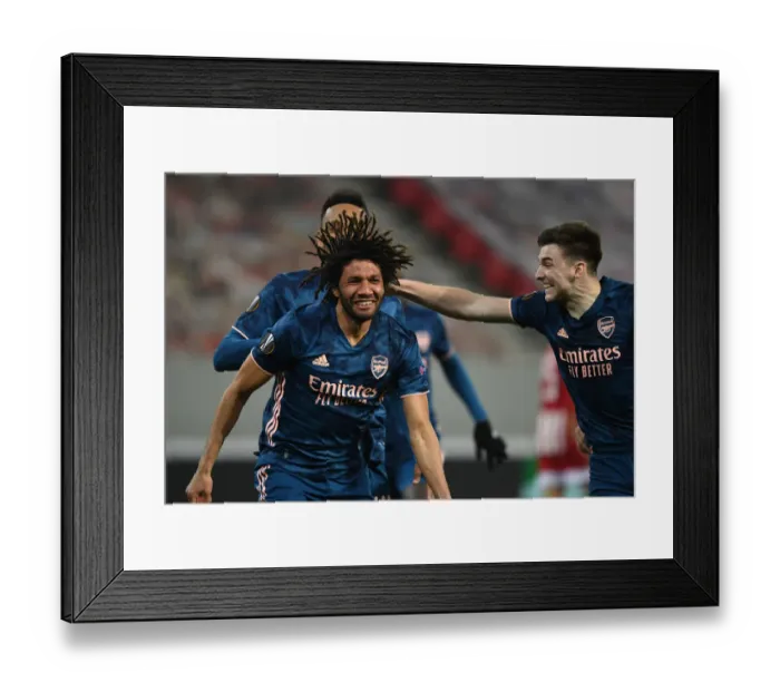 Framed Print : Arsenal's Elneny, Aubameyang, and Tierney Celebrate Goals in Empty Olympiacos Stadium during Europa League Match