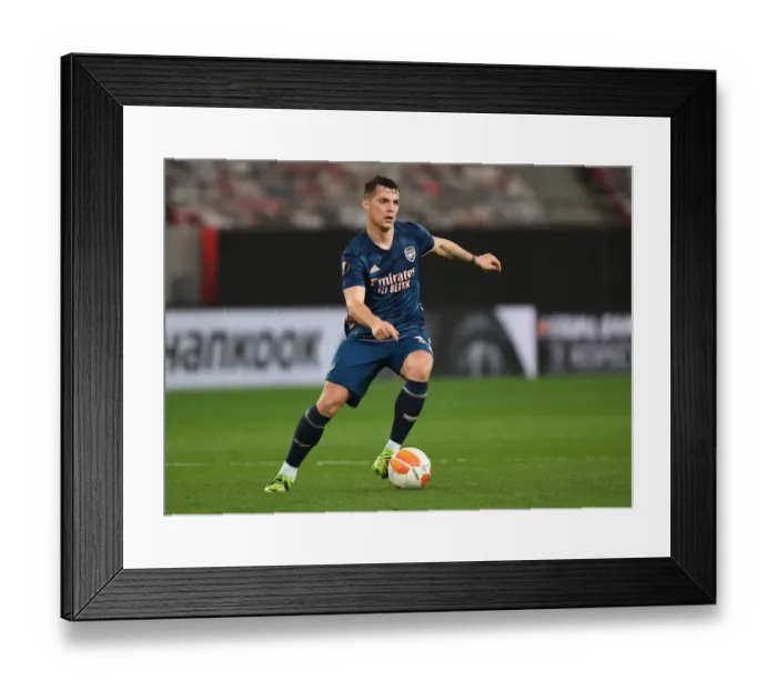 Framed Print : Arsenal's Granit Xhaka in Empty Europa League Match: Olympiacos vs. Arsenal (2020-21) Framed Print : Arsenal's Granit Xhaka in Empty Europa League Match: Olympiacos vs. Arsenal (2020-21)