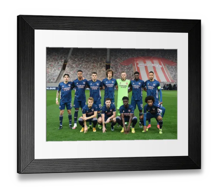 Framed Print : Arsenal Faces Olympiacos in Empty Karaiskakis Stadium: UEFA Europa League Round of 16, Match One