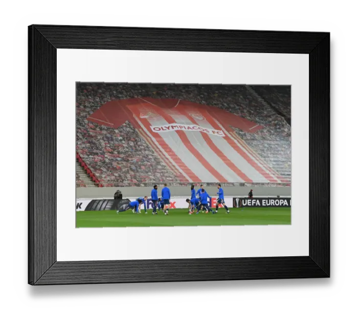 Framed Print : Arsenal's Empty Europa League Battle Against Olympiacos in Piraeus Framed Print : Arsenal's Empty Europa League Battle Against Olympiacos in Piraeus